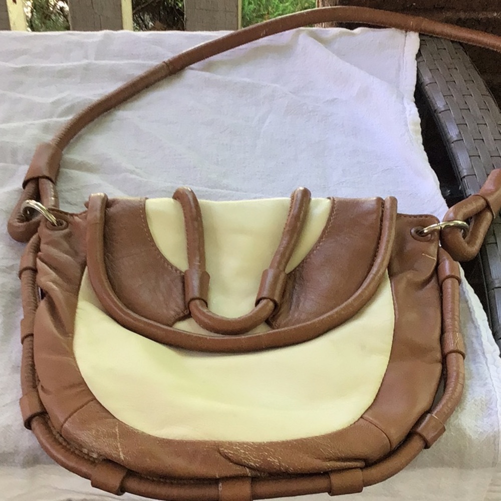 Cynthia Rowley cream and tan leather small crossbody. Used, good condition